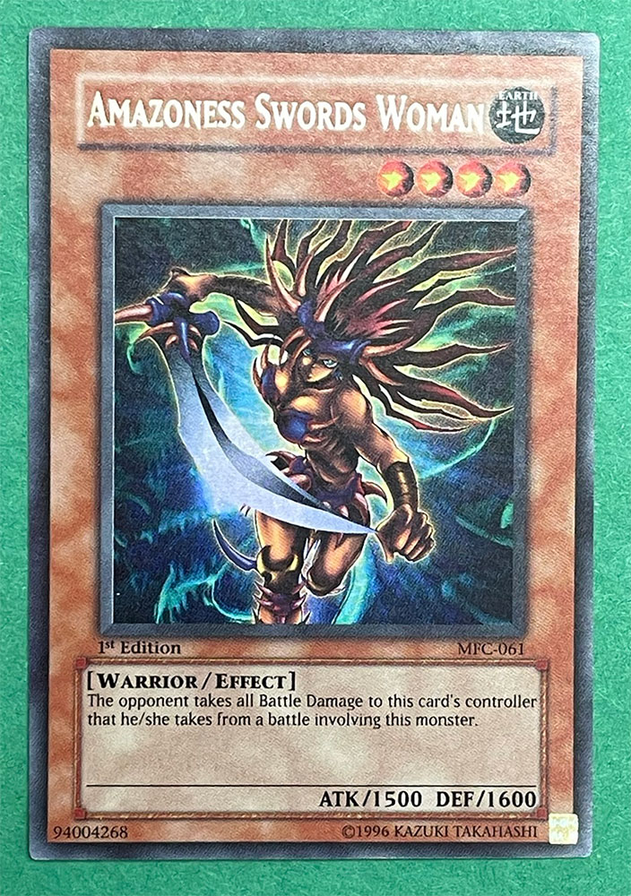 Yu-Gi-Oh Card - MFC-061 - AMAZONESS SWORDS WOMAN (ultra rare holo)(1st  Edition) *Non-Mint - Played*